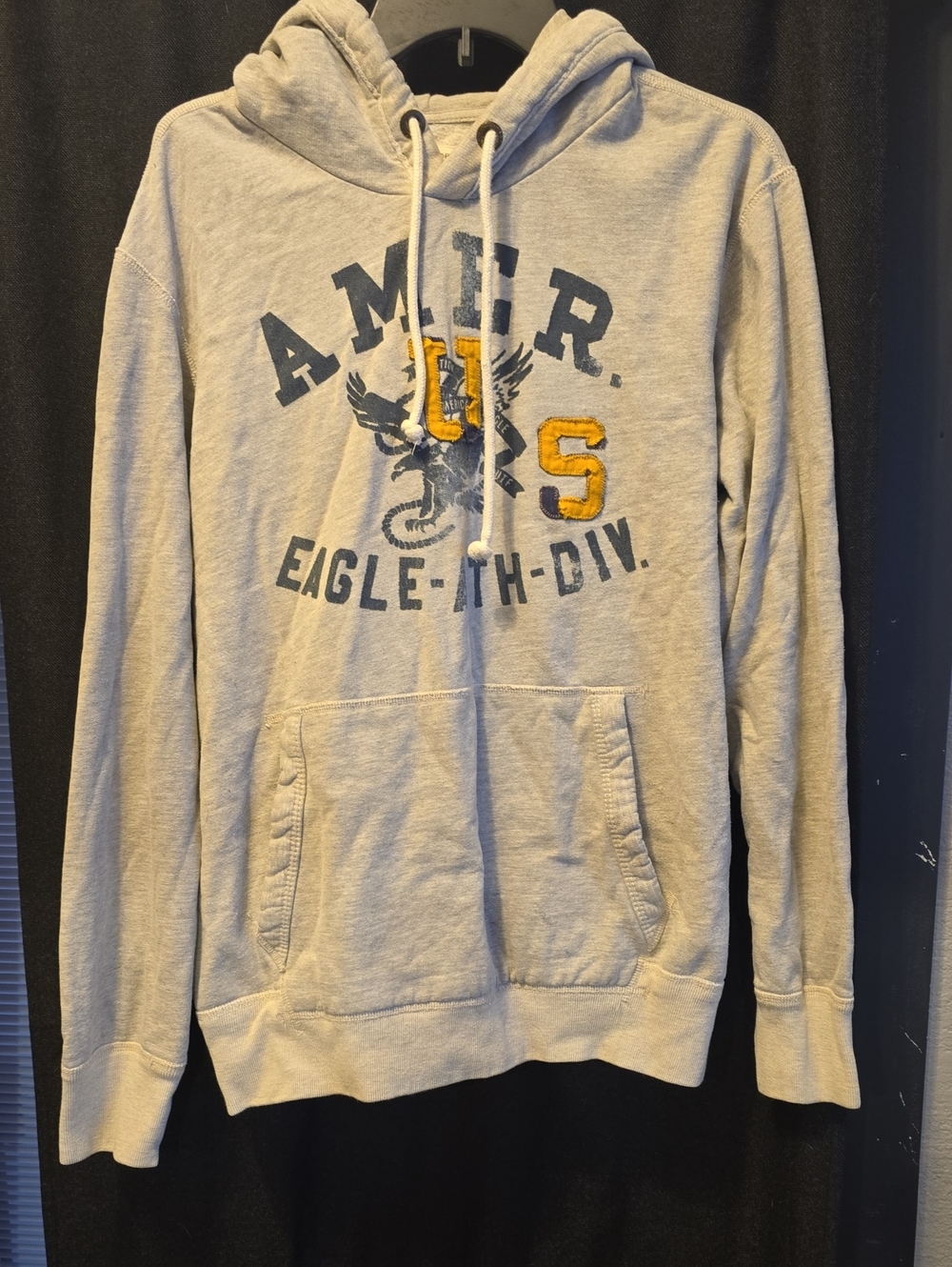 American Eagle Outfitters Light Gray Hoodie with Yellow Graphic